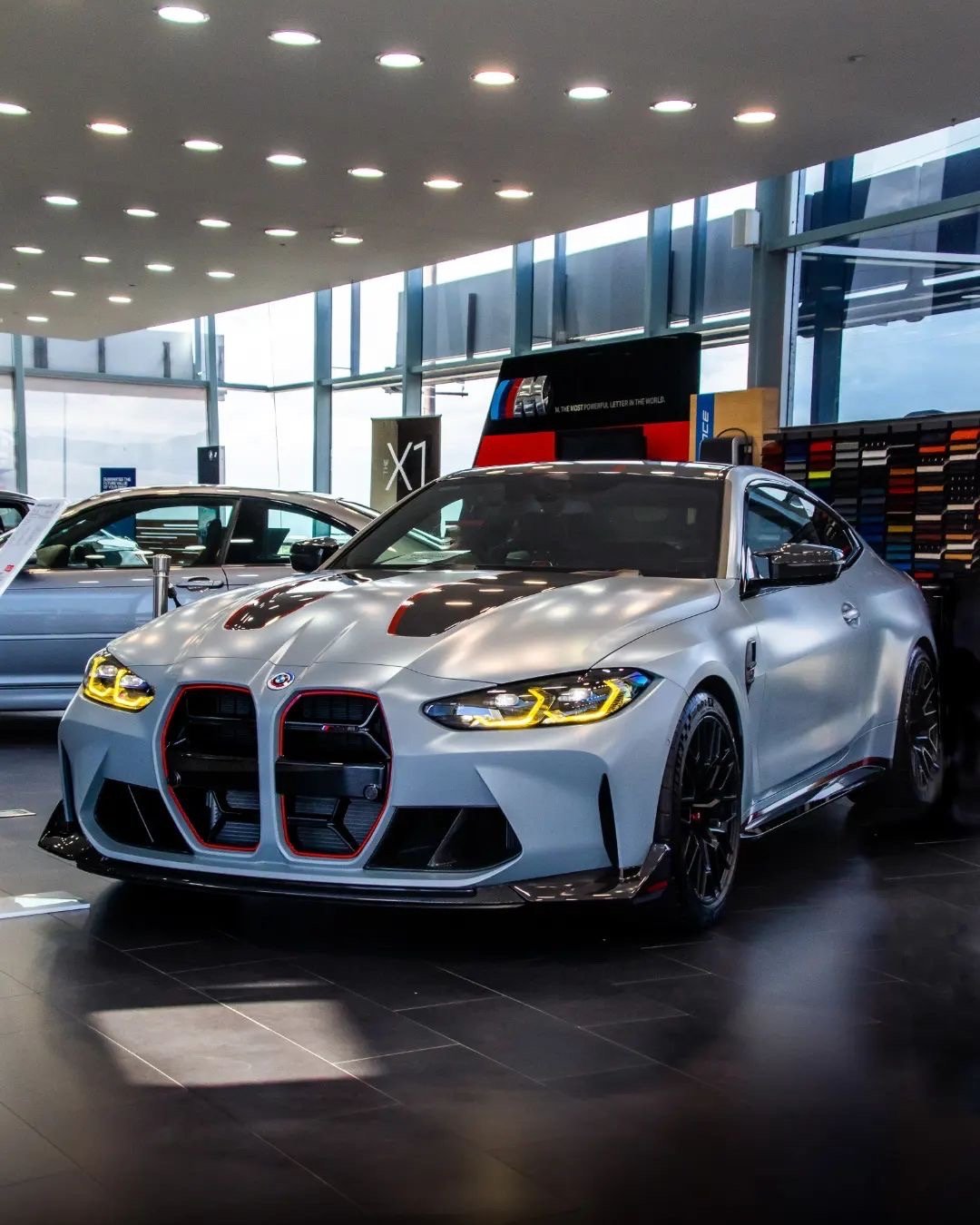 BMW M4 CSL together with the iconic E46 